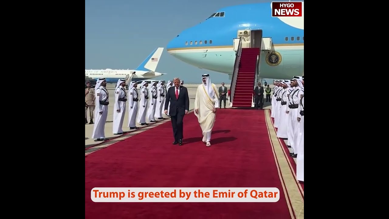 Trump is greeted by Emir Sheikh Tamim bin Hamad Al-Thani at the Amiri Diwan in Doha, Qatar